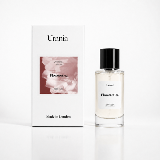 Perfume bottle and packaging of 'Urania Flowerotica' on a white background